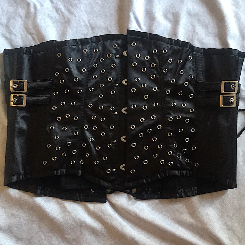 Steel boned corset with grommet & buckle details